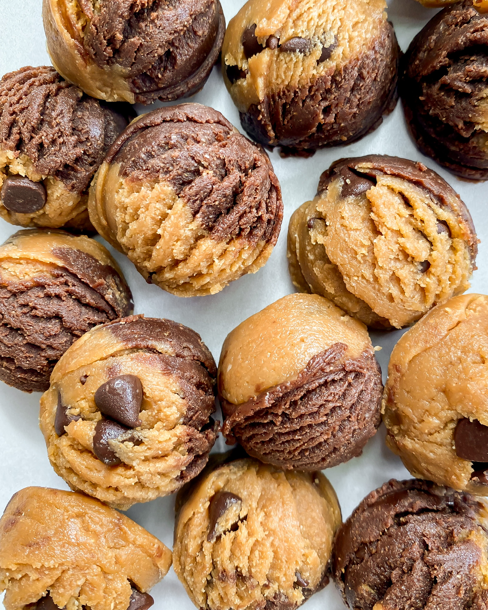 multiple healthy brookie (brownie + cookie) dough batter bites