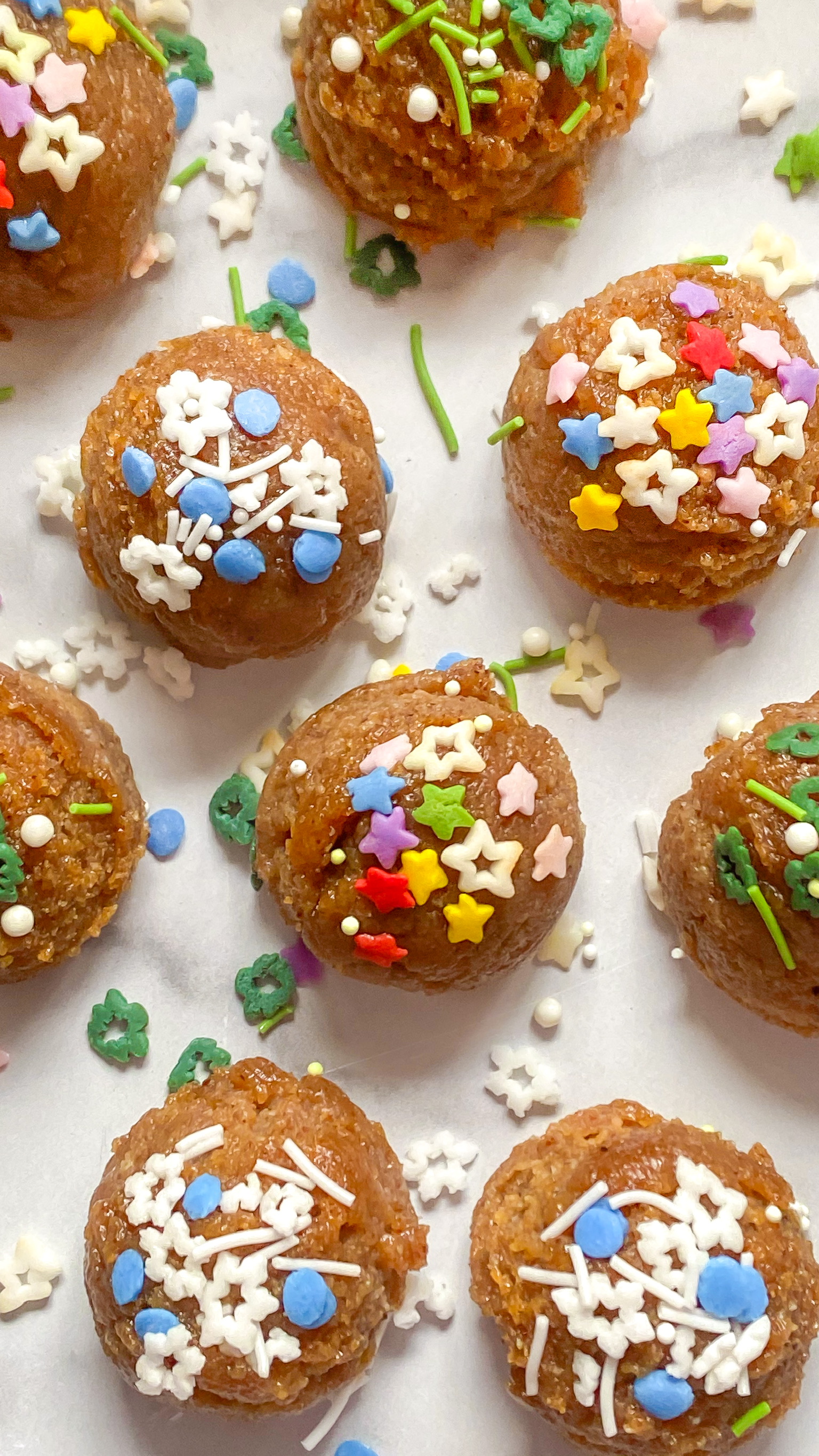 healthy sugar cookie dough bites arranged on pan